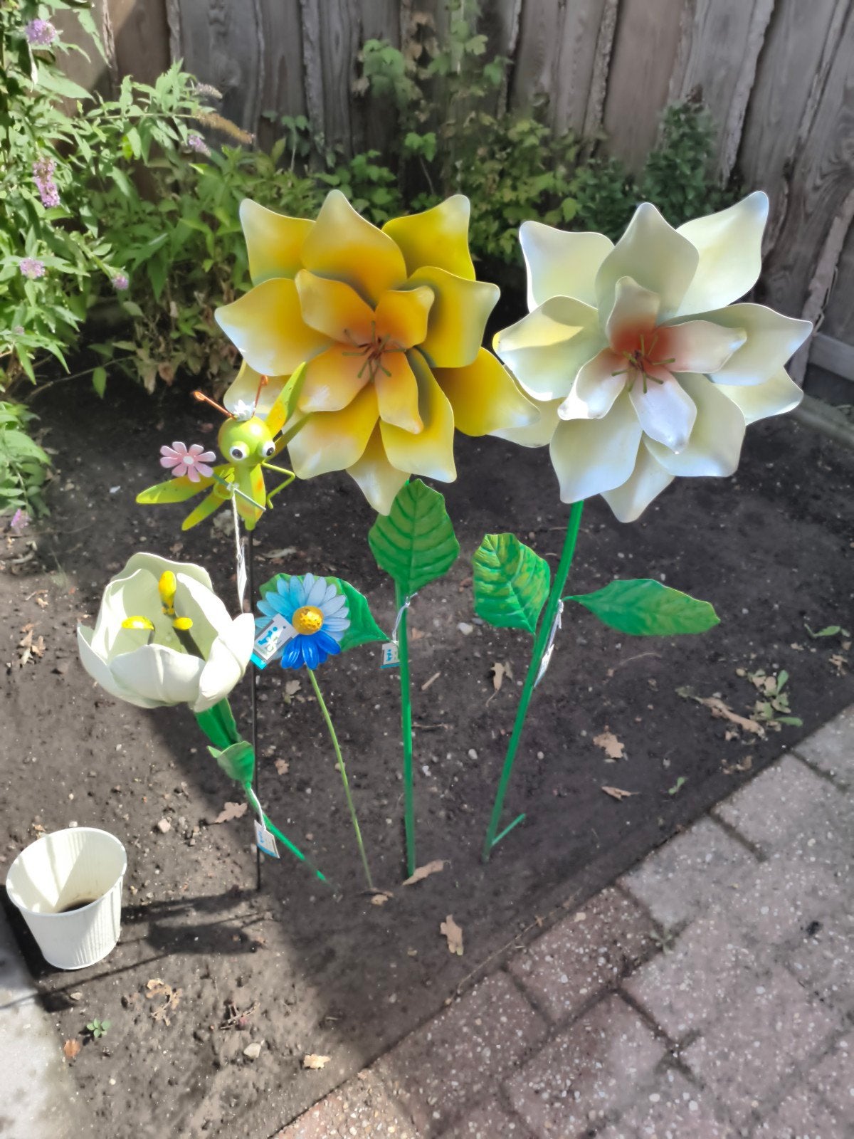 Metalen bloemen voor tuindecoratie, Ophalen