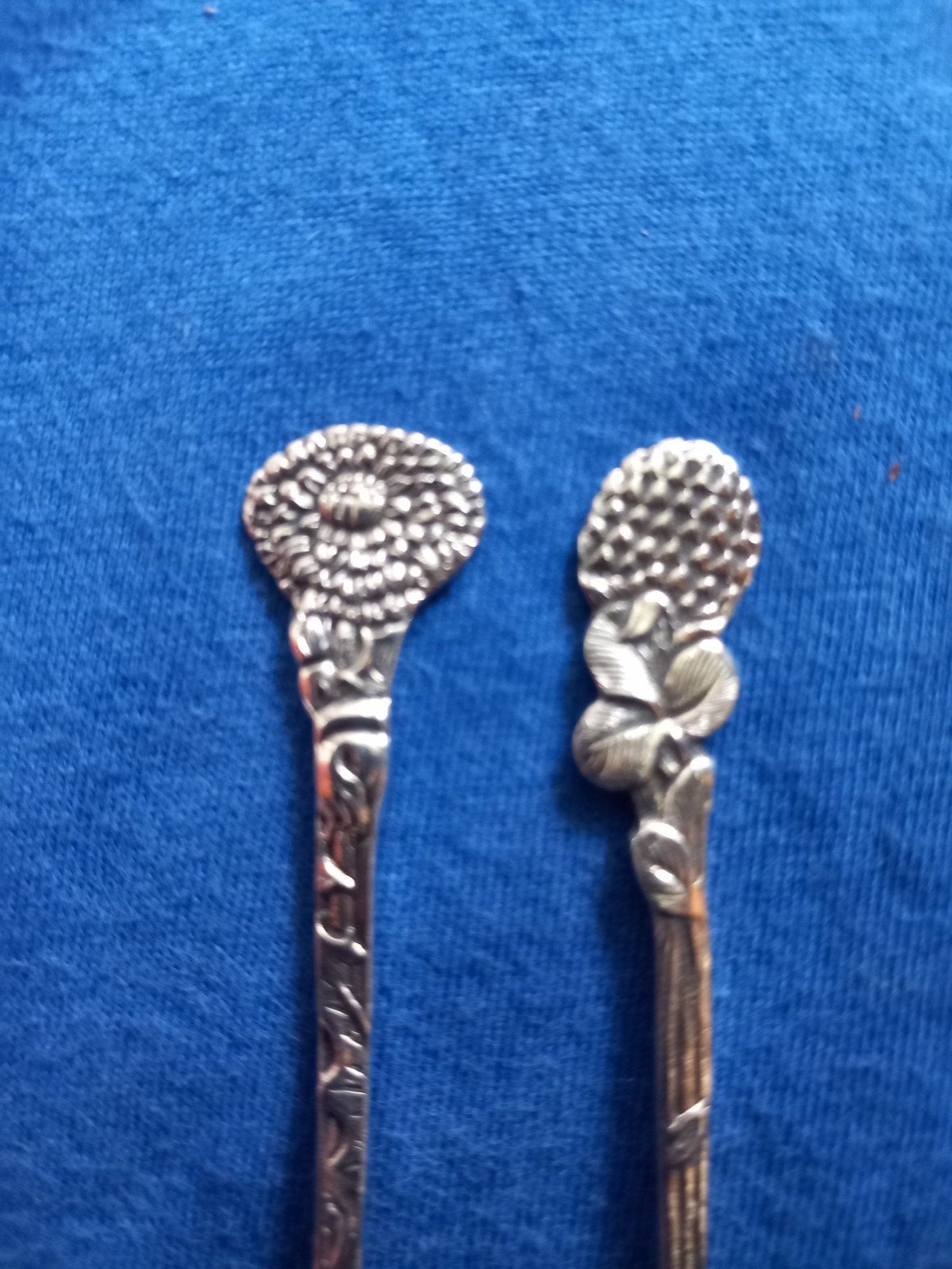 2x bloemenlepeltjes Herbert Hooijkaas verzilverd 90, Ophalen of Verzenden