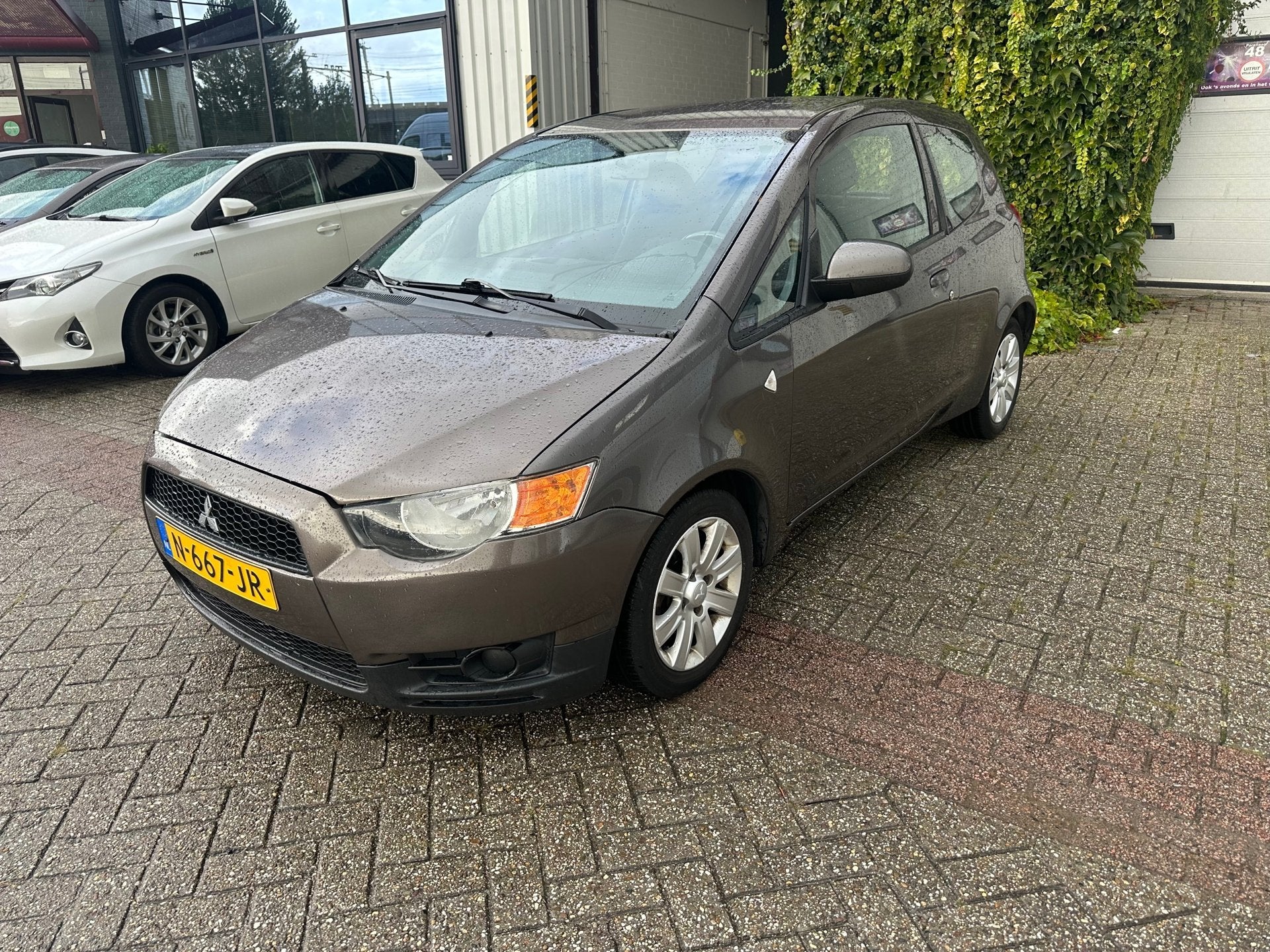 Mitsubishi Colt 1.1 Inbusiness, Auto's, Voorwielaandrijving, Euro 5, Gebruikt, Bruin