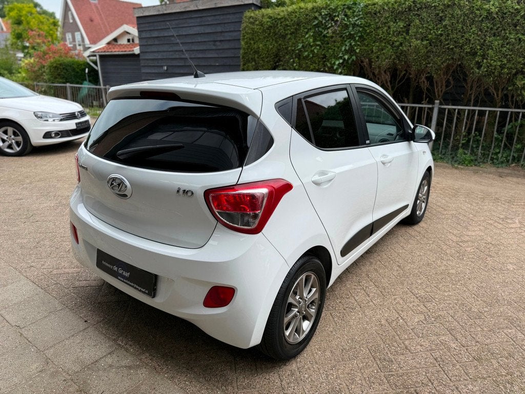 Hyundai I10i 1.2|4-CILINDER/AIRCO/CRUISE/BLUETOOH/STOELVRW, Auto's, Hyundai, Voorwielaandrijving, Gebruikt, 4 cilinders, Wit