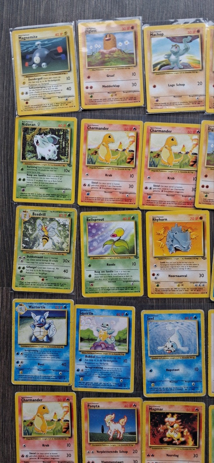 Pokémon kaarten 1995-2000 (NL) + blik - 95 stuks, Ophalen, Gebruikt, Meerdere kaarten, Foil