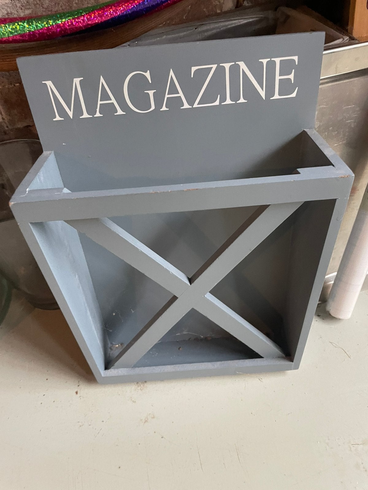 Magazine houder, Ophalen, Zo goed als nieuw