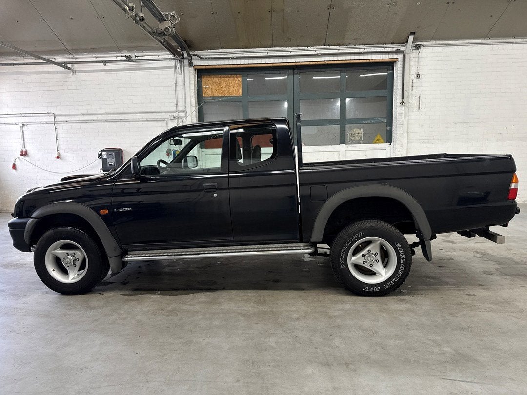 Mitsubishi L 200 2.5 Club Cab | 1e eigenaar | Trekhaak, Auto's, Gebruikt, 4 cilinders, 2477 cc, Zwart