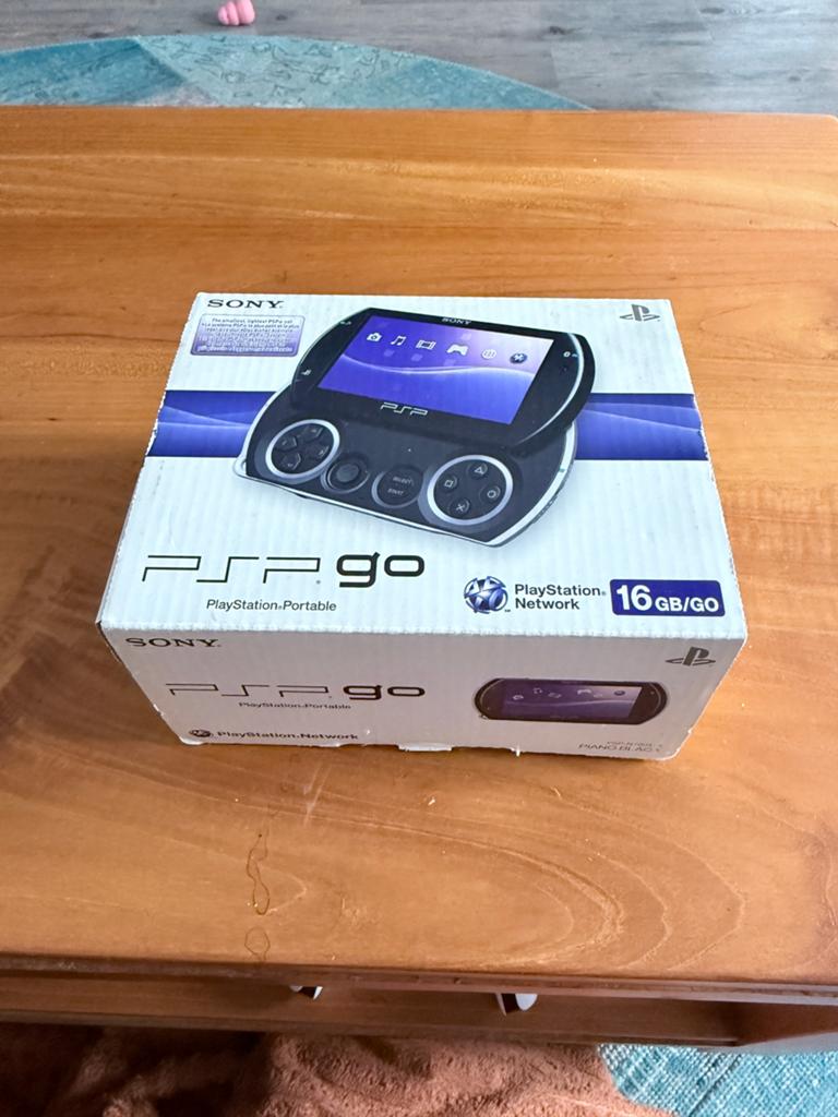PspGo, Spelcomputers en Games, Spelcomputers | Sony PSP, Ophalen of Verzenden, Zo goed als nieuw, Zwart, PSP Go