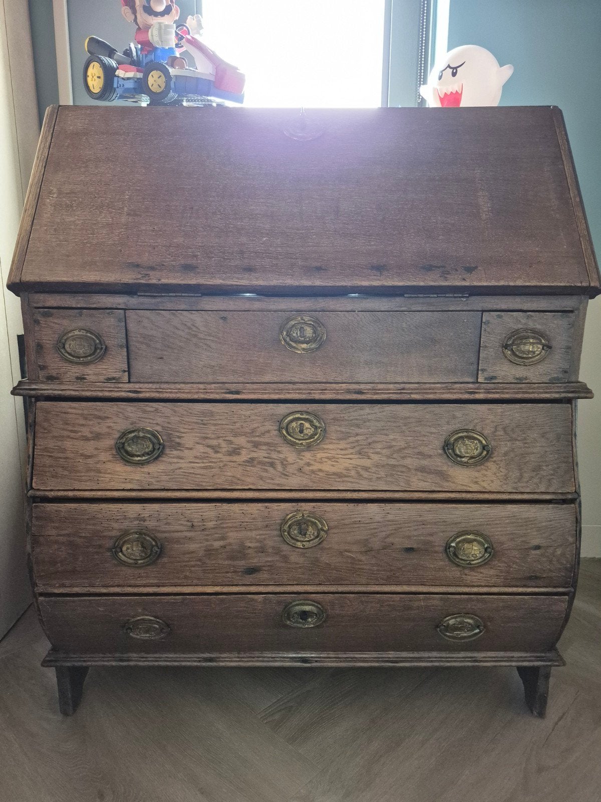 Buikkastje/ buiksecretaire/ bureau, Ophalen
