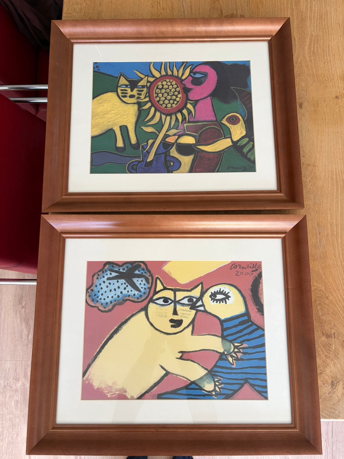 Twee Corneille posters ingelijst, Ophalen