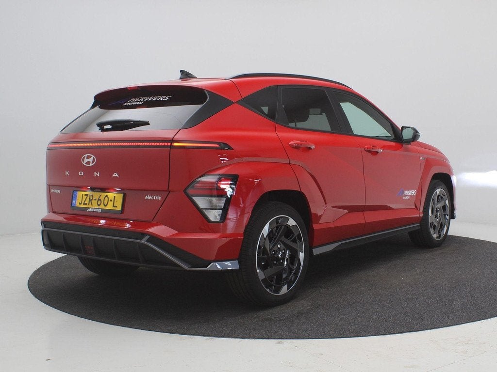Hyundai KONA Electric N Line Business 64.8 kWh / Navigatie /, Auto's, Hyundai, Stof, 750 kg, Automatische klimaatregeling, Origineel Nederlands