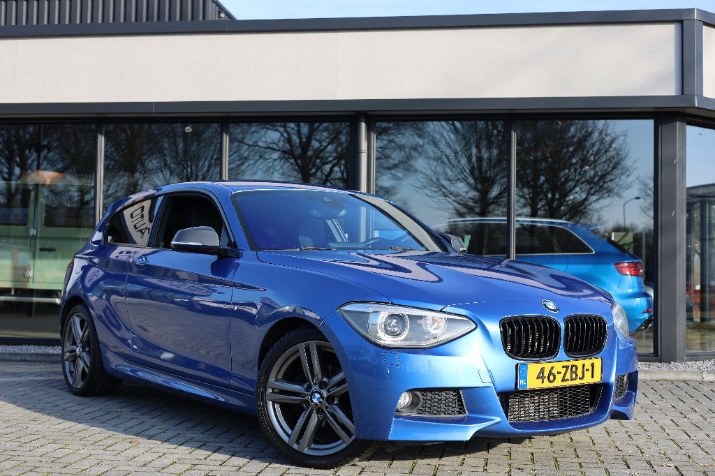 BMW 1-Serie 114I 75KW 3-DR 2012 Blauw M - Pakket Estoril, 1-Serie, Achterwielaandrijving, Zwart, 4 cilinders