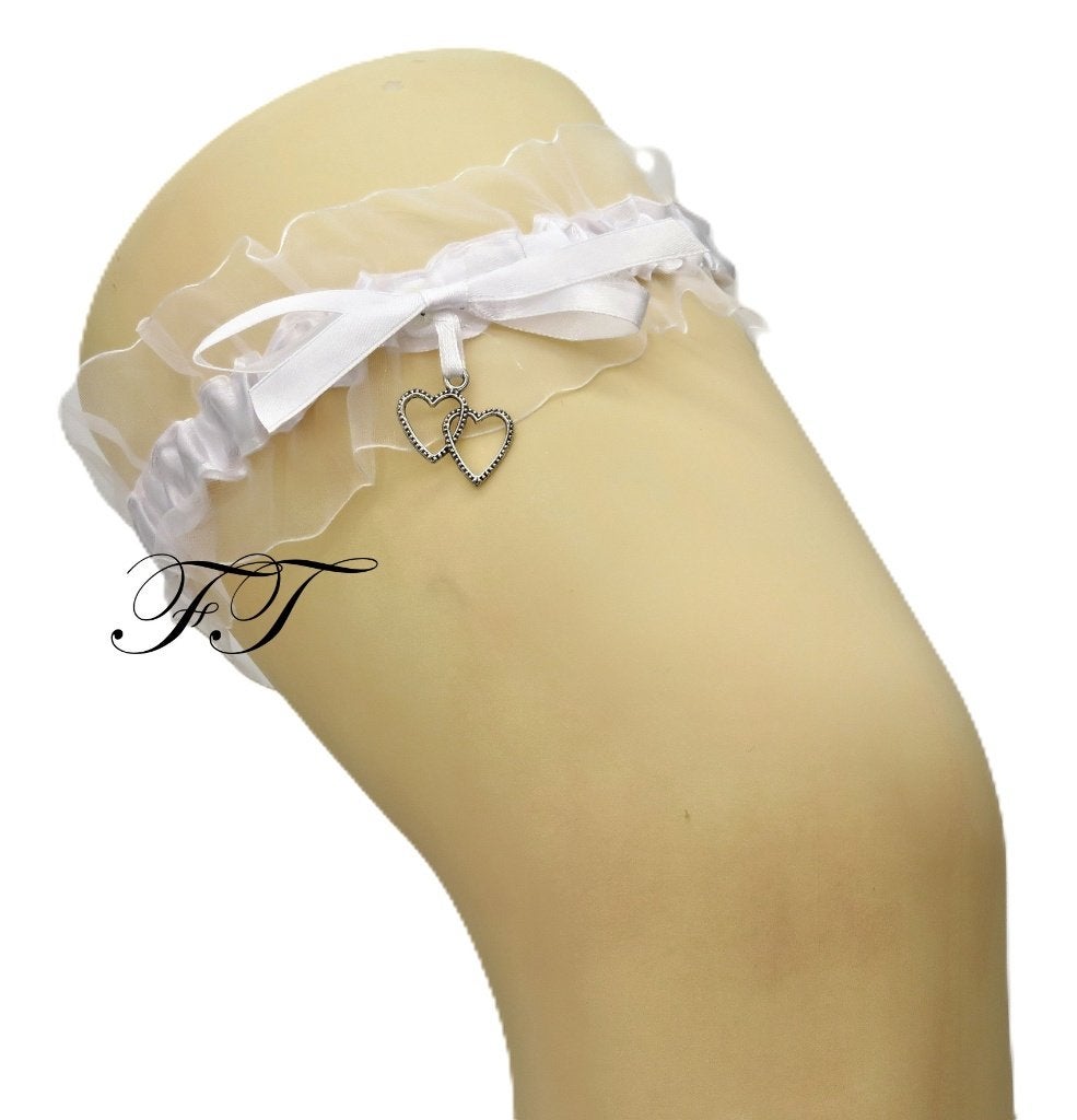 Schitterende witte bruid kousenband met 2 hartjes., Ophalen of Verzenden, Nieuw