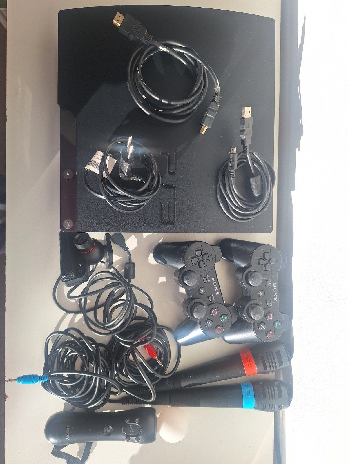 PlayStation 3 met accessoires en 18 spellen, Spelcomputers en Games, Ophalen, Met 2 controllers, Slim, Gebruikt