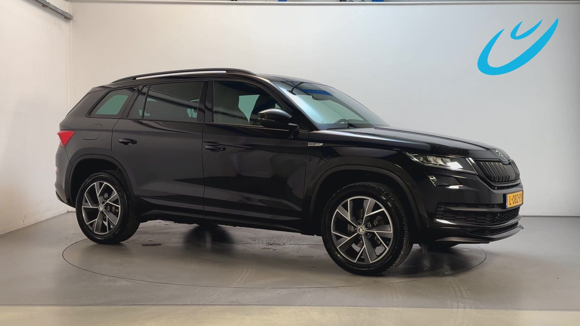 Skoda Kodiaq 1.5 TSI 150pk DSG Sportline Business Alcantara, Auto's, Dealer onderhouden, 4 cilinders, Zwart, Origineel Nederlands