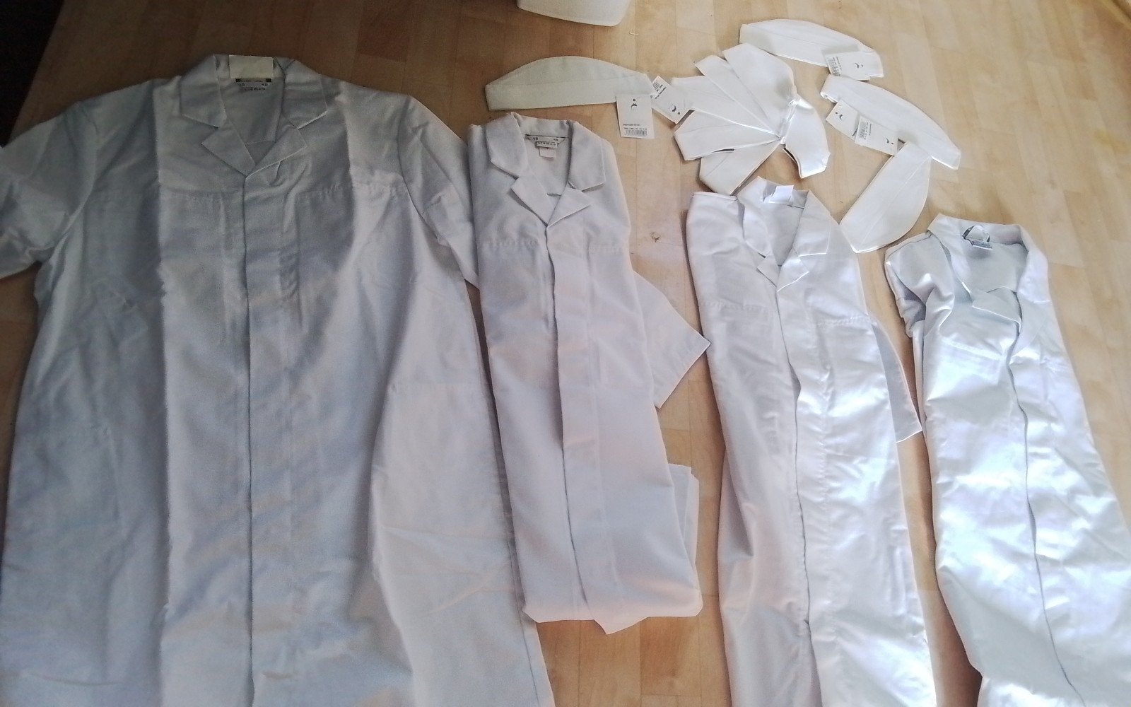 Nieuwe  witte  werk jas  en mutsen  maat 48  50 en 52, Ophalen of Verzenden, Nieuw