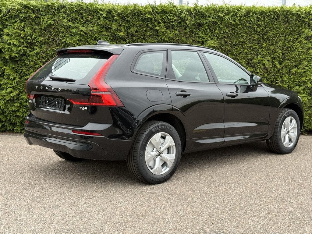 Volvo XC60 2.0 T6 Plug-in hybrid AWD Essential, Auto's, Volvo, Automaat, Stof, 4 cilinders, Zwart