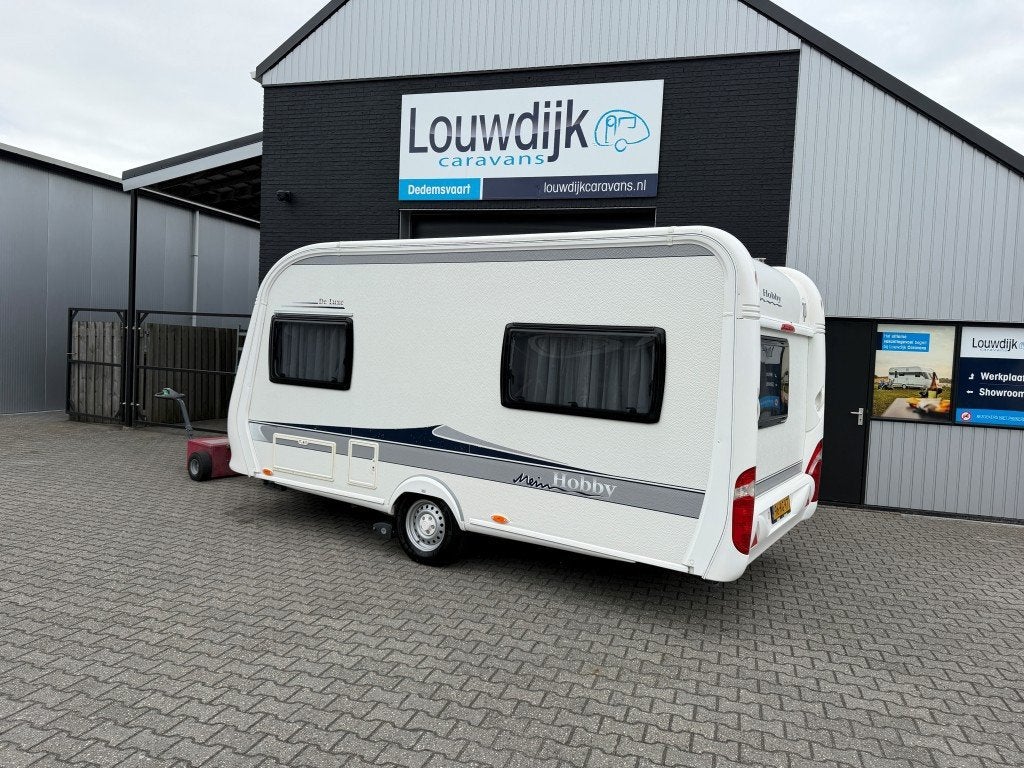 HOBBY De Luxe 440 SF ’11 (Mover, Vastbed 210cm), Caravans en Kamperen, Vast bed, Hobby, Bedrijf, Treinzit