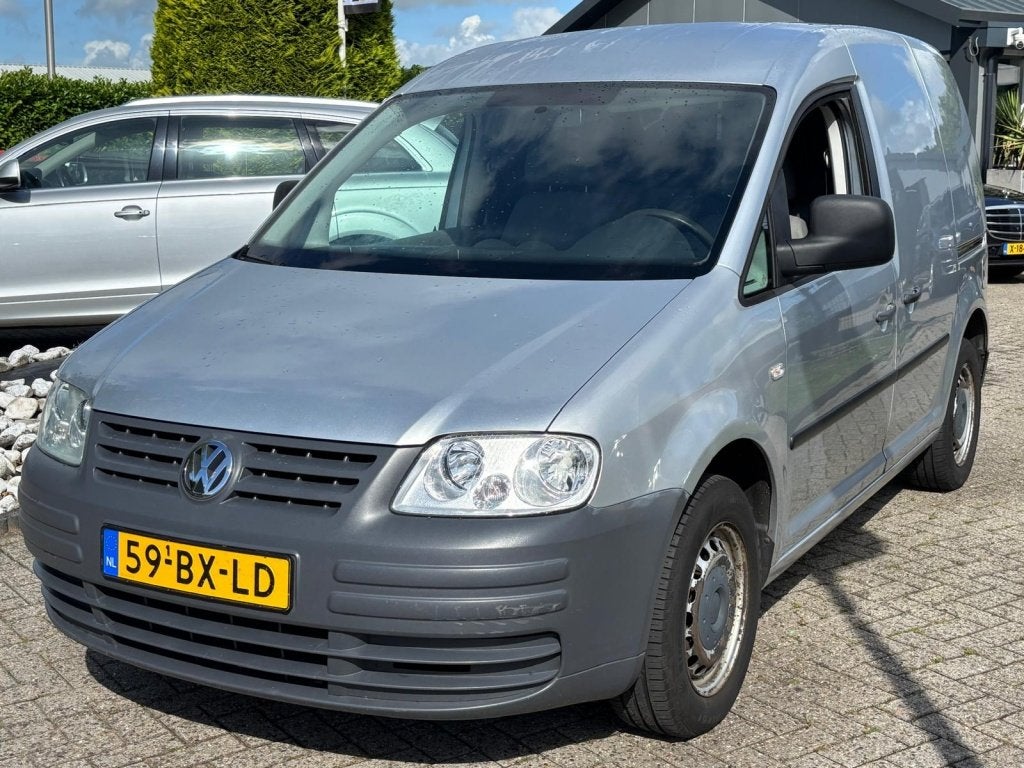 Volkswagen Caddy 1.9 TDI 105PK 2X Schuifdeur Trekhaak Youngt, Stof, Gebruikt, Volkswagen, Origineel Nederlands