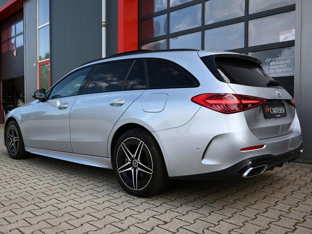 Mercedes C-klasse Estate 300 e AMG Line 313PK | Pano | Lucht, Automaat, Achterwielaandrijving, Gebruikt, Zwart