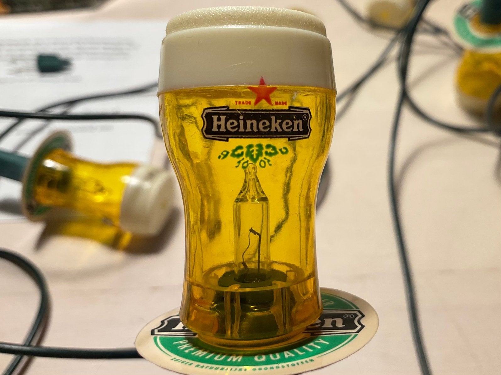 Heineken kerstlampjes in de vorm van een bierglas met viltje, Ophalen of Verzenden, Gebruikt, Overige typen, Heineken