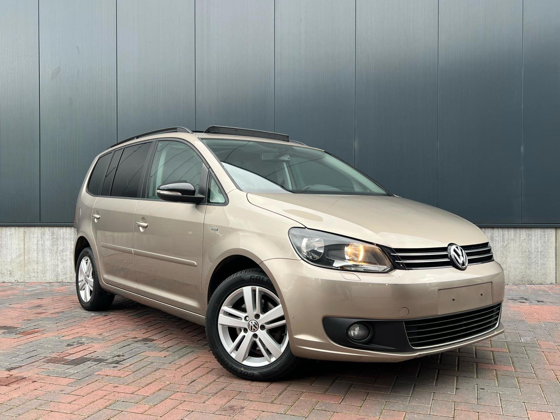 Volkswagen Touran 1.2 TSI Highline BlueMotion * Navi * Cruis, Auto's, Gebruikt, Zwart, 4 cilinders, Origineel Nederlands
