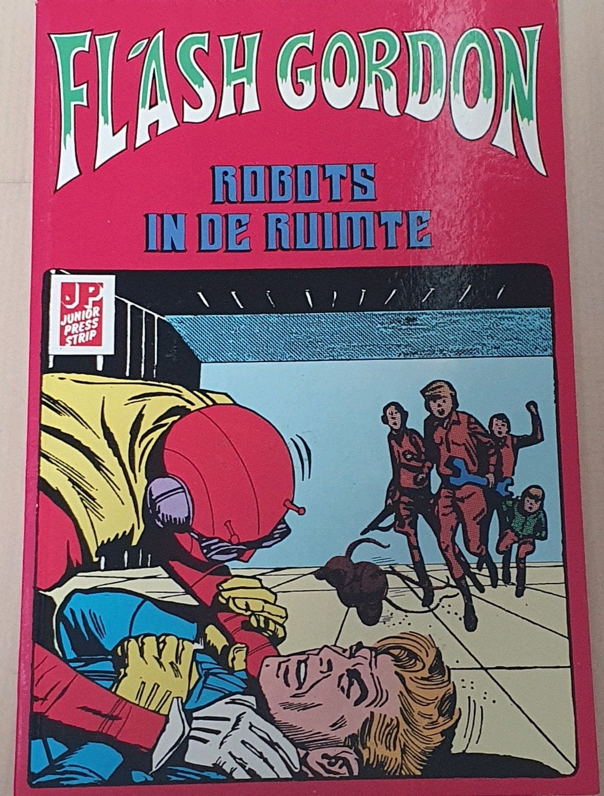 Te koop: Flash Gordon - Robots in de Ruimte (Junior Press), Boeken, Stripboeken, Eén stripboek, Ophalen of Verzenden, Gelezen