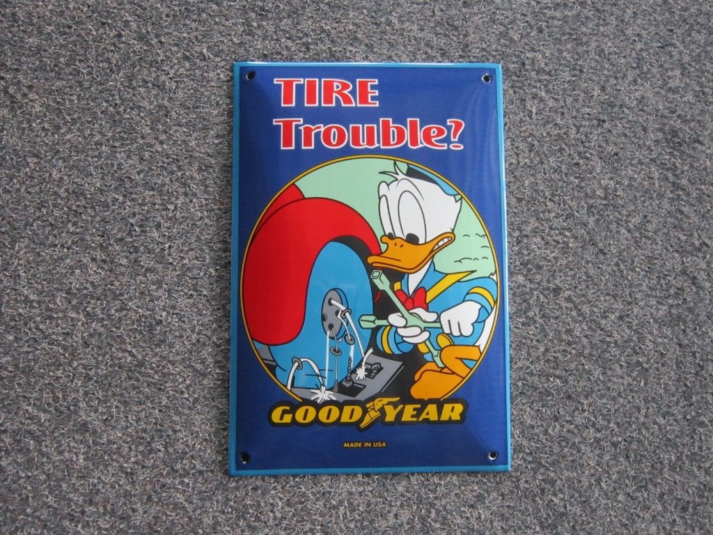 GOODYEAR DONALD DUCK EMAILLE RECLAMEBORD., Ophalen, Zo goed als nieuw, Reclamebord