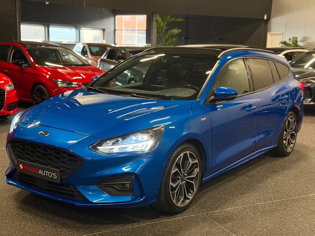 Ford Focus Wagon 1.5 EcoBoost ST-Line LED/NAVI/CRUISE/CARPLA, Stof, Gebruikt, Euro 6, Blauw