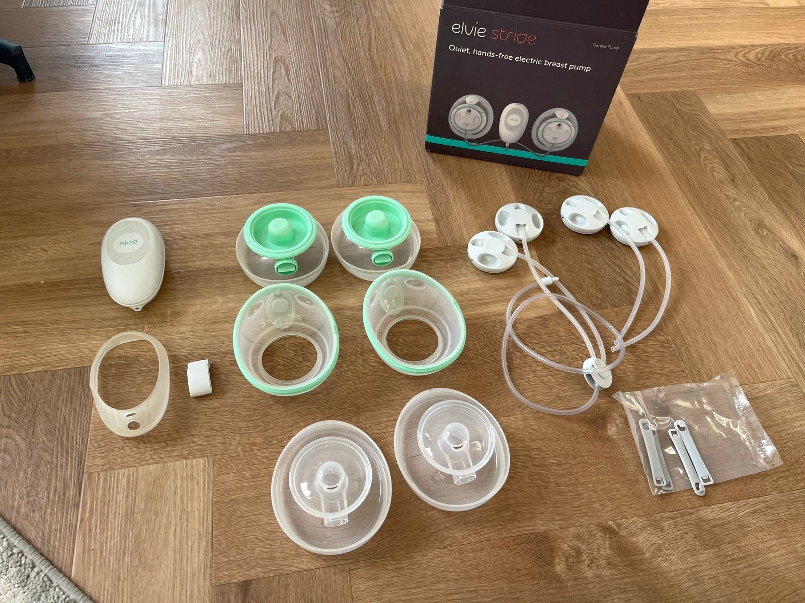 Elvie Stride kolfapparaat met garantie, Kinderen en Baby's, Babyvoeding en Toebehoren, Ophalen of Verzenden, Zo goed als nieuw