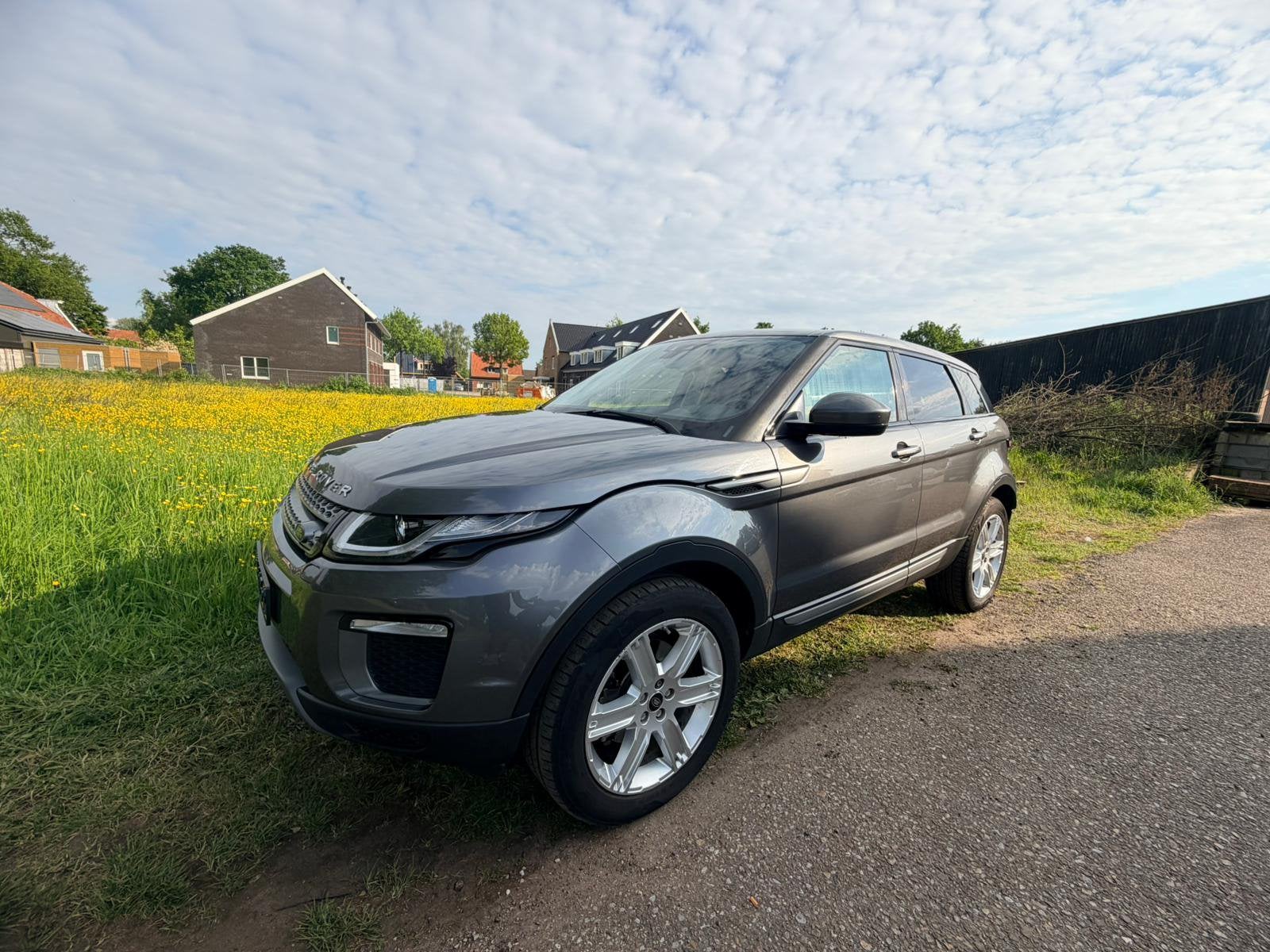 Land Rover Range Rover Evoque 2.0 TD4 4WD AUT 2016 Grijs, Auto's, Land Rover, Automaat, Achterwielaandrijving, Zwart, 2000 kg