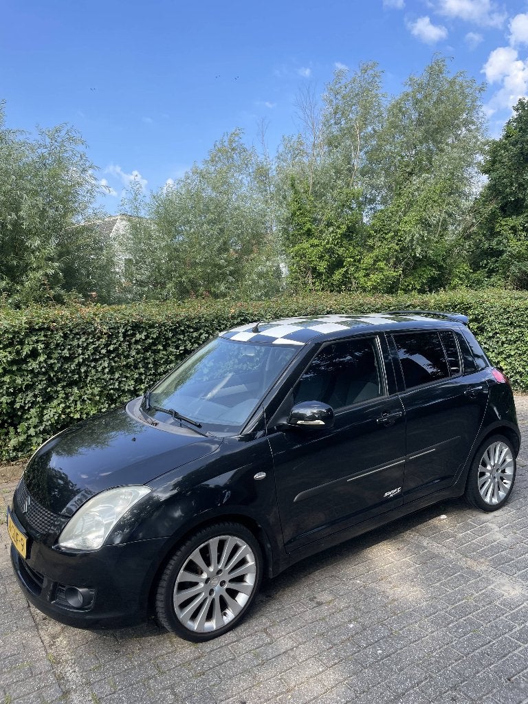 Suzuki Swift 1.3 68KW 93PK 5D 2008 Zwart + Zwart/Wit dak, Auto's, Achterwielaandrijving, 40 €/maand, 400 kg, Alcantara