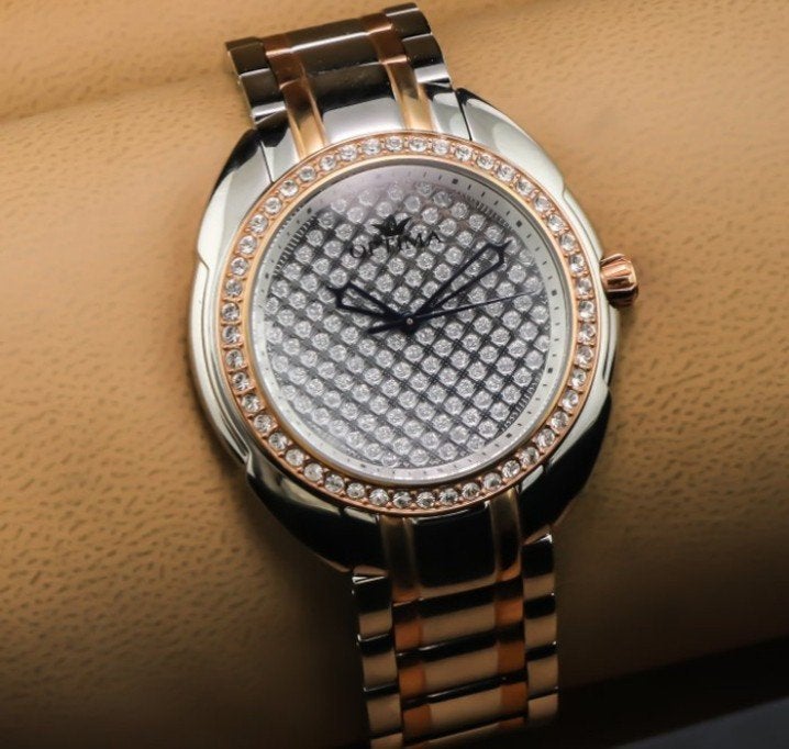 Optima Dameshorloge OSL322 met Strass en Tweekleurige Band, Overige merken, Staal, Ophalen of Verzenden, Zo goed als nieuw