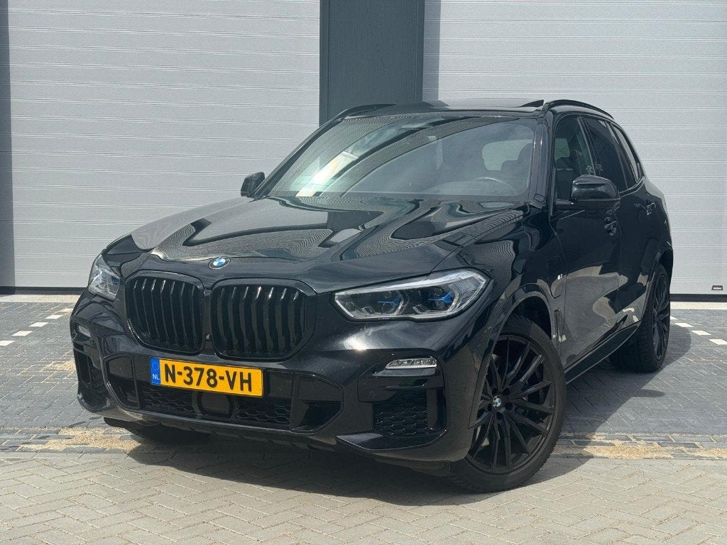 BMW X5 Xdrive45e BTW MSport Pano Laser HuD H&K All-inprijs, Zwart, Vierwielaandrijving, Hybride Elektrisch/Benzine, SUV of Terreinwagen