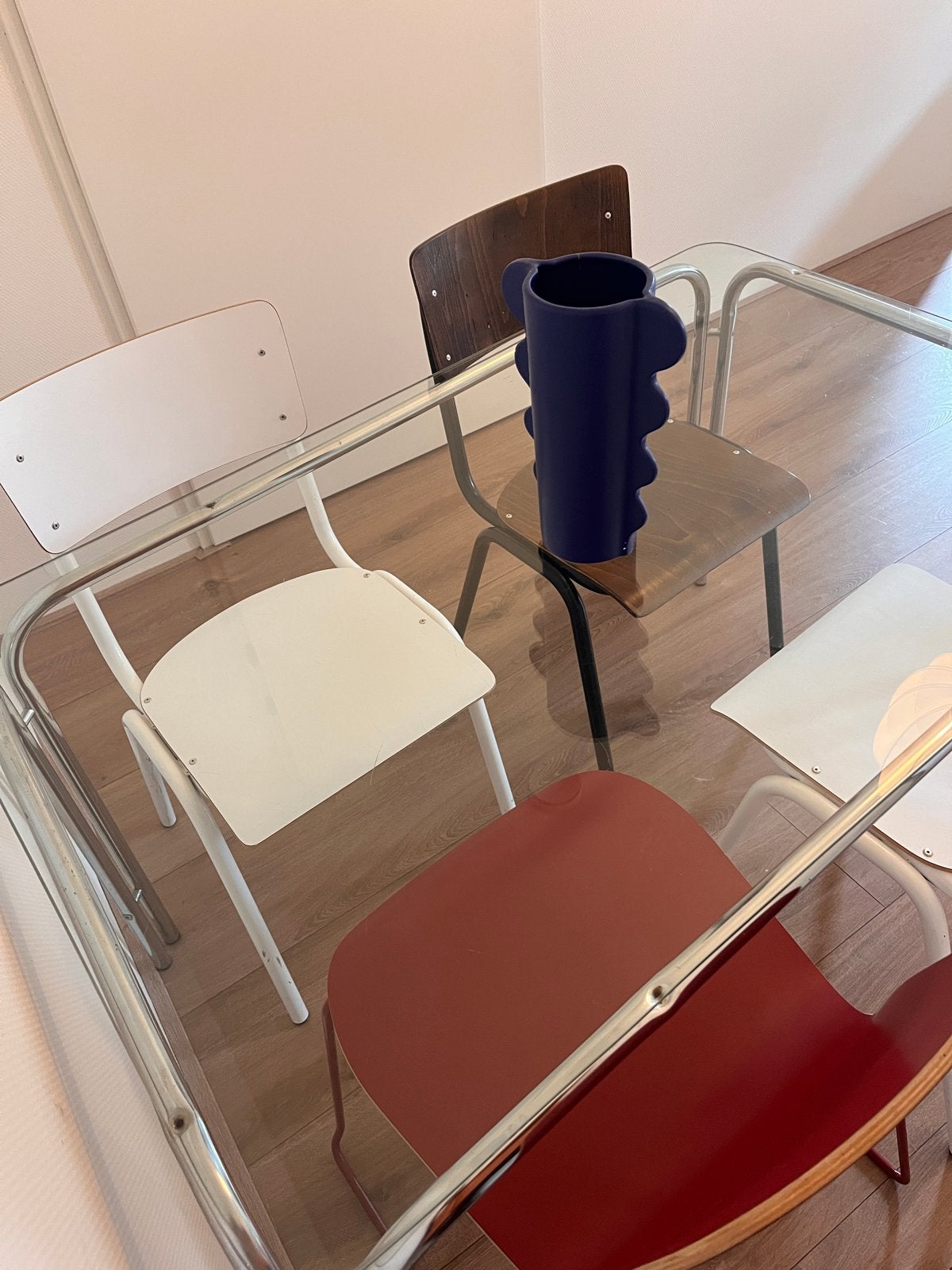 Glazen eettafel met chromen onderstel plus stoelen, Ophalen, Gebruikt, 100 tot 150 cm, 50 tot 100 cm