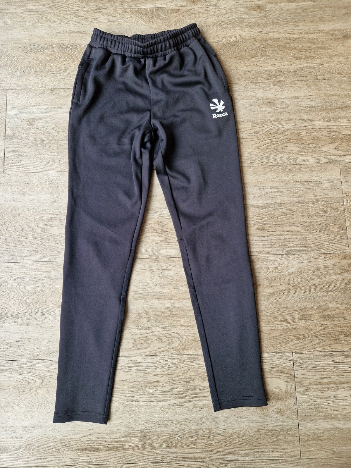 Hockey trainingsbroek Reece maat 164 - zwart - Zo goed als n, Ophalen of Verzenden, Zo goed als nieuw, Kleding