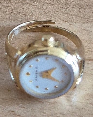 Prachtige goud vergulde Prisma dames ring horloge., Overige merken, Staal, Staal, Polshorloge