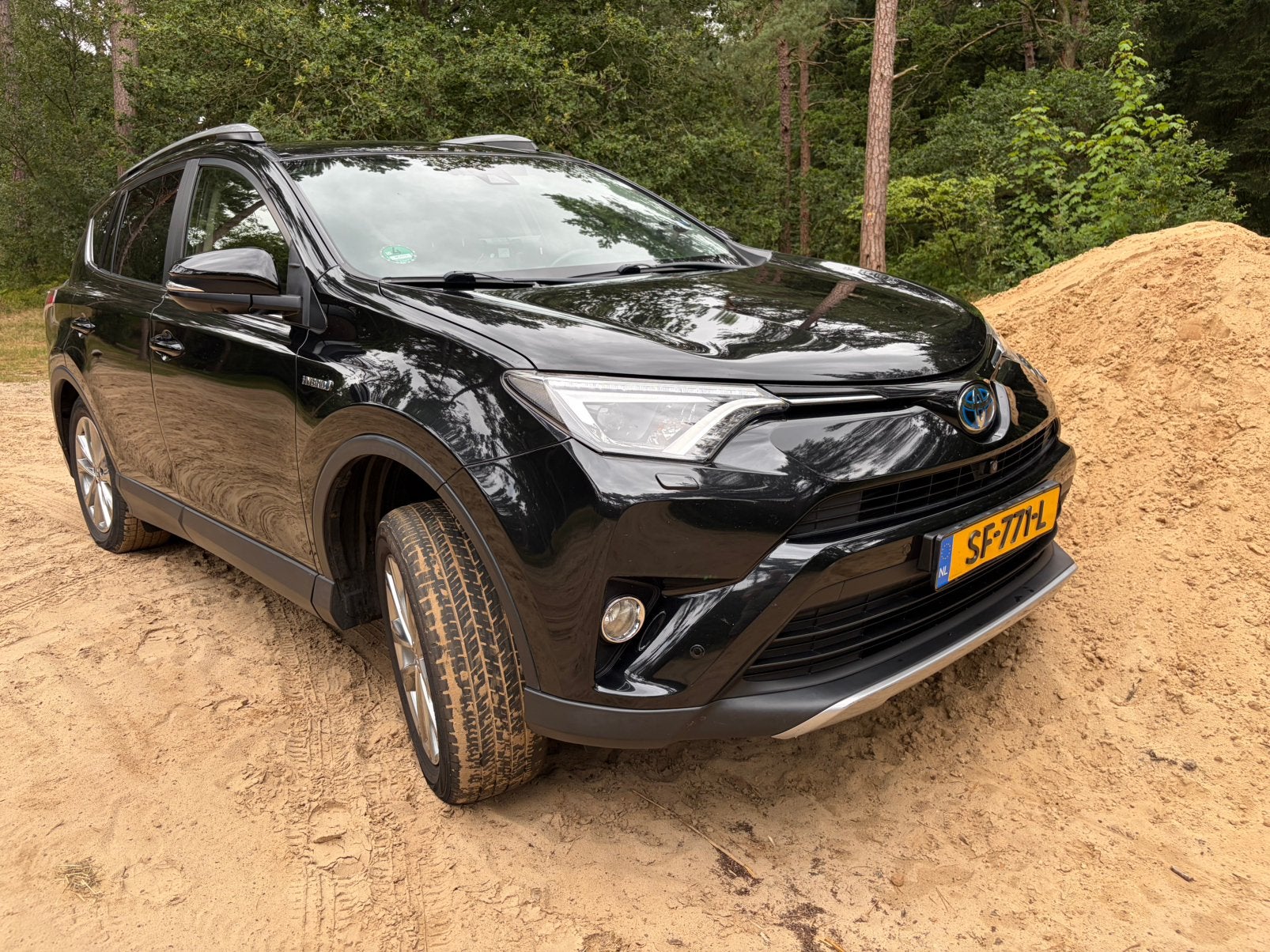Toyota Rav4 2.5 AWD  HYBRID 145KW met fabrieksgarantie, Automaat, Zwart, 2494 cc, 1650 kg