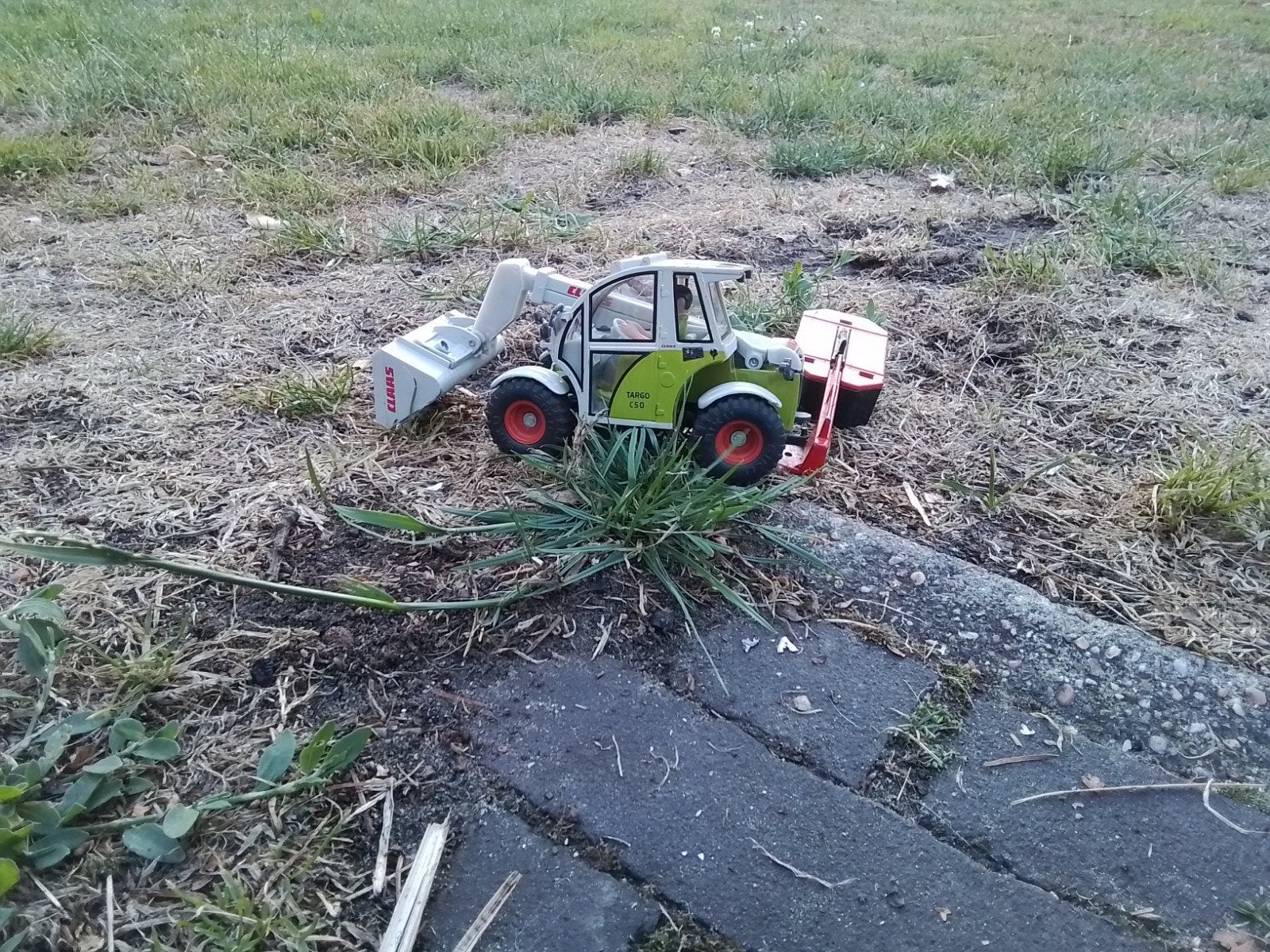 Claas speelgoed graafmachine met aanhanger, Ophalen of Verzenden, Gebruikt