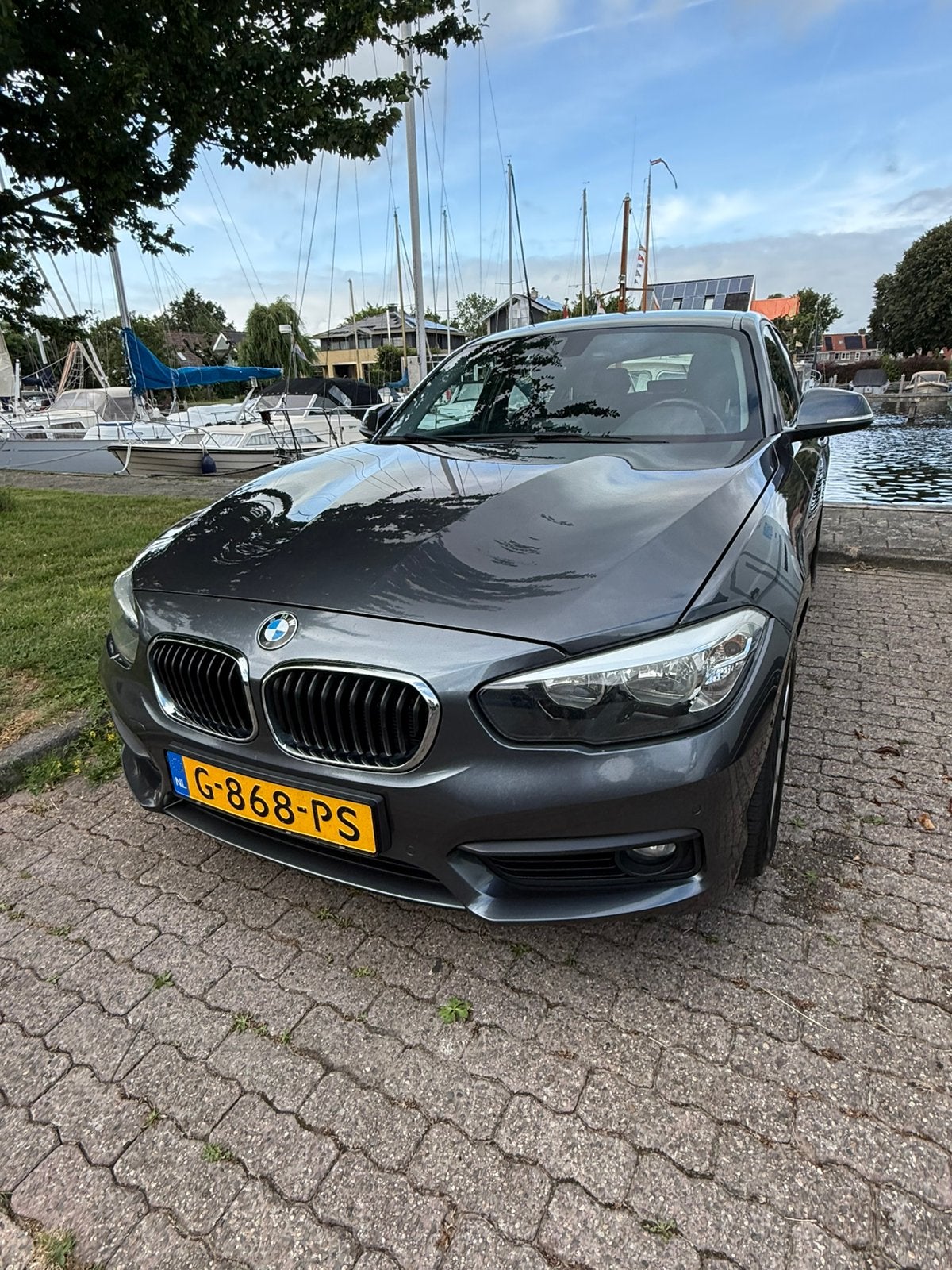 BMW 1-Serie 116d 116pk Aut 2016 Grijs, Auto's, BMW, 3 cilinders, 1500 kg, Hatchback, 5 stoelen