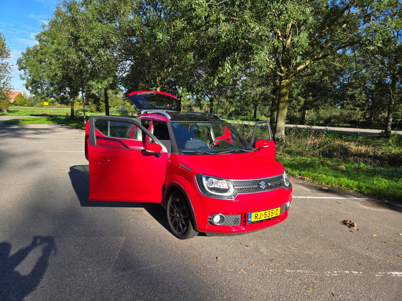 Suzuki Ignis 1.2 Dualjet 90pk Smart Hybrid 2017 Rood, Auto's, Voorwielaandrijving, 1242 cc, 4 cilinders, 23 km/l