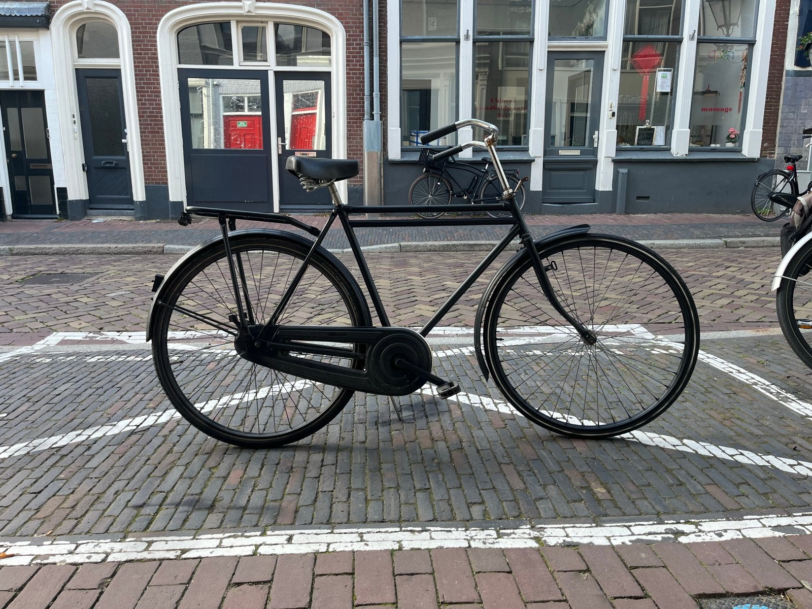 28 inch mat zwarte fiets met terugtraprem, Ophalen, Gebruikt, 26 inch of meer