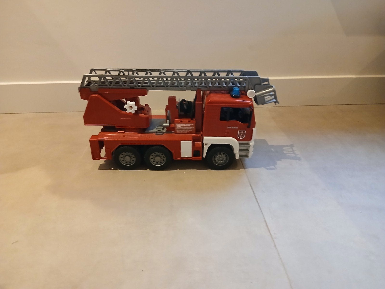 Bruder Brandweerwagen met uitschuifbare ladder, Ophalen, Gebruikt