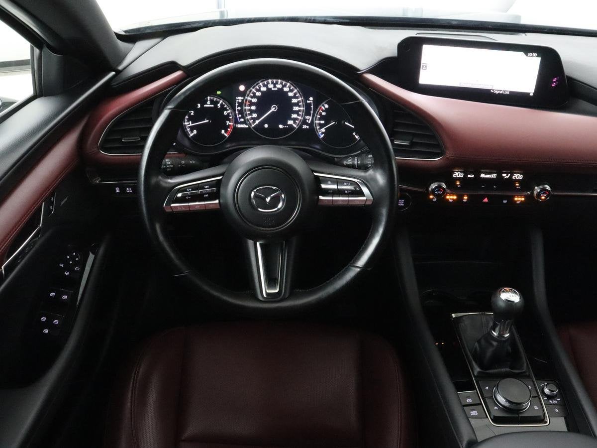 Mazda 3 2.0 e-SkyActiv-X M Hybrid 186 Luxury | Leder Dieproo, Auto's, Voorwielaandrijving, 1998 cc, Gebruikt, Handgeschakeld