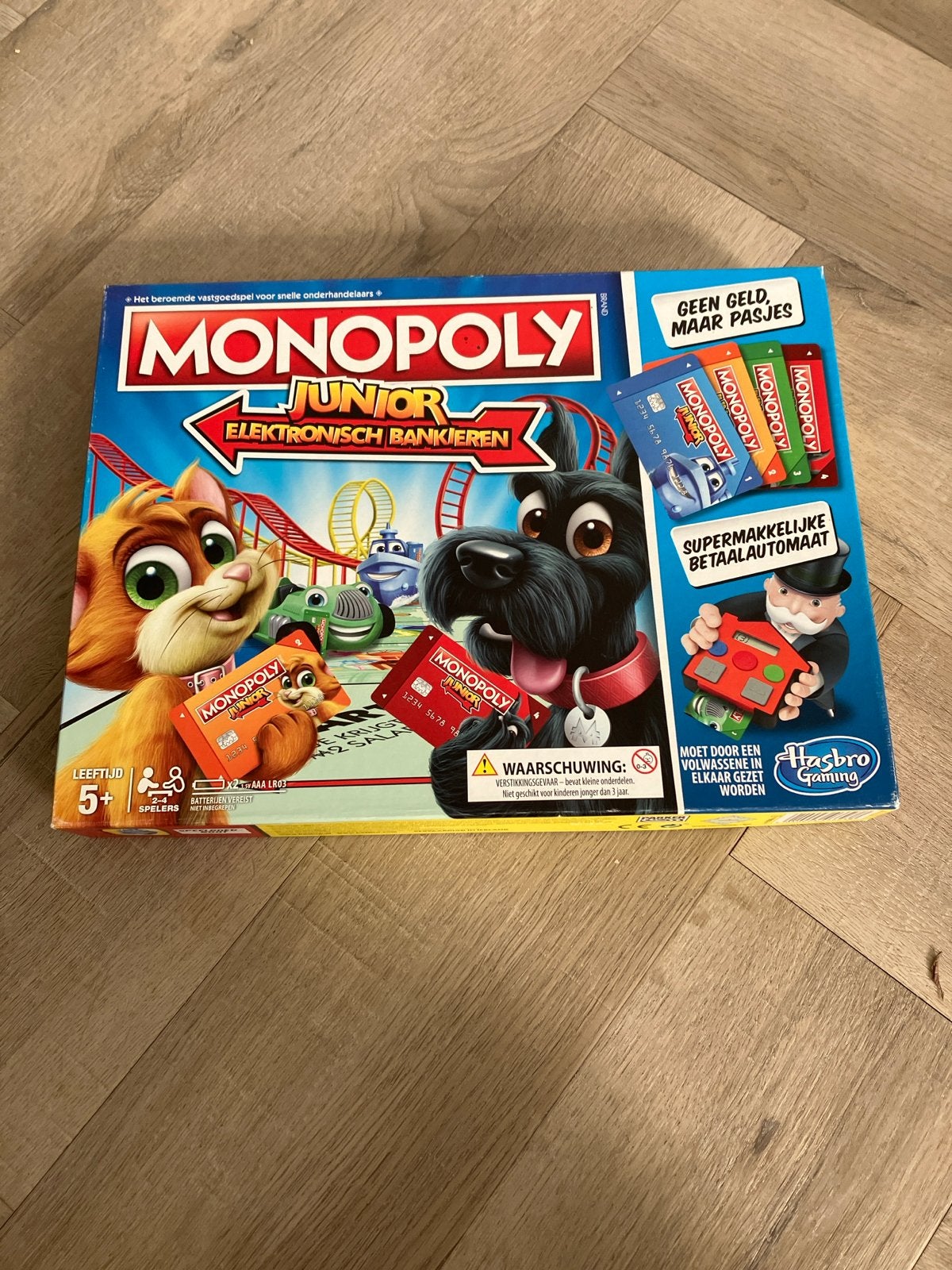 Monopoly Junior Elektronisch Bankieren - Compleet, Hobby en Vrije tijd, Gezelschapsspellen | Bordspellen, Drie of vier spelers