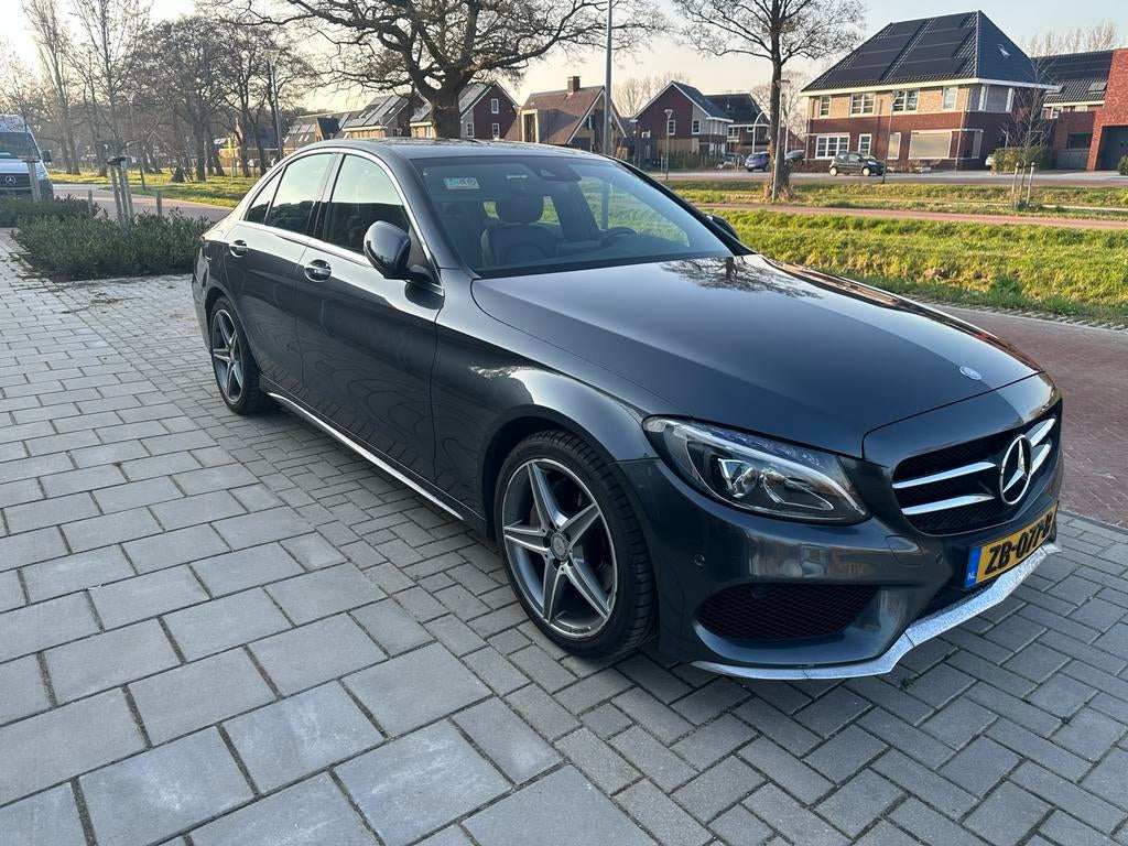 Mercedes-Benz C 180 AMG-pakket Automaat Leer Navigatie LED, Automaat, 1800 kg, Zwart, Particulier