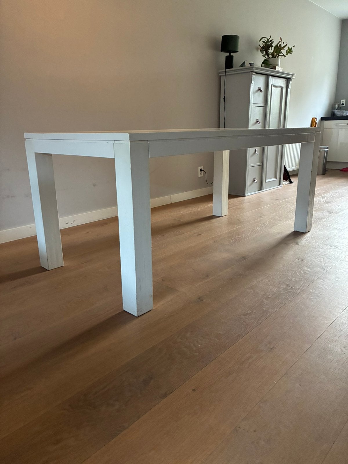 Witte houten eettafel, Ophalen, Zo goed als nieuw, 75 m² of meer, Laminaat
