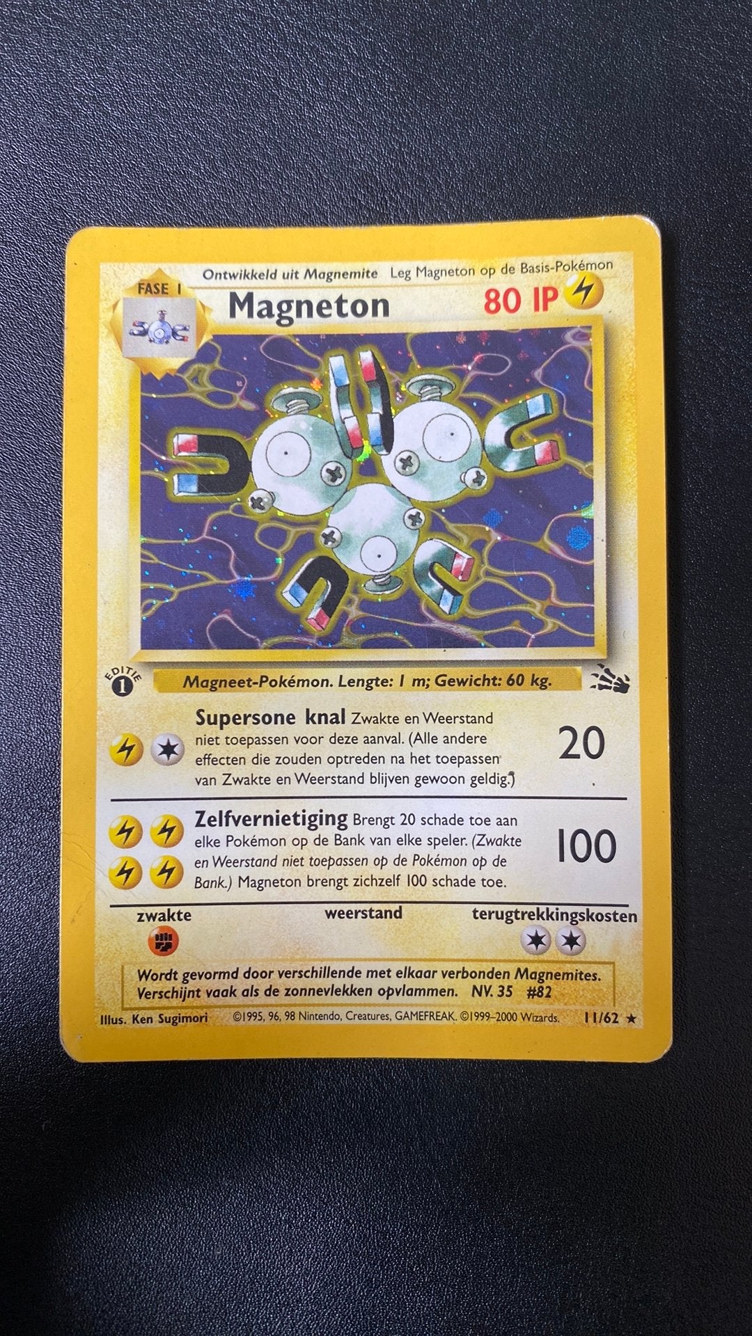 Pokemon magneton 11/62 fossil nederlands 1st editie, Hobby en Vrije tijd, Verzamelkaartspellen | Pokémon, Ophalen of Verzenden