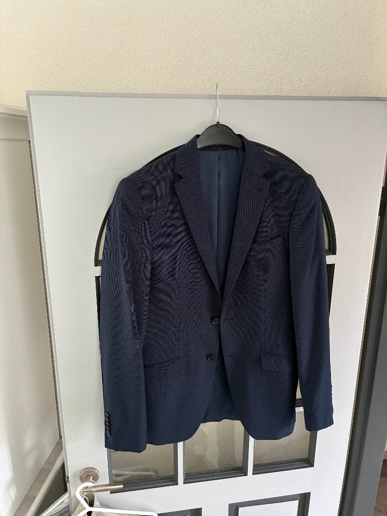 kostuum donker blauw slim fit, Ophalen of Verzenden, Zo goed als nieuw, Maat 46 (S) of kleiner, Blauw