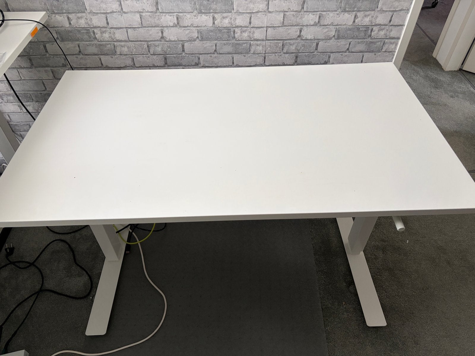 IKEA Trotten Zit-sta Bureau Wit - 120x70 cm, Huis en Inrichting, Bureaus, Zit-sta bureau, Gebruikt, Spaanplaat of MDF, In hoogte verstelbaar