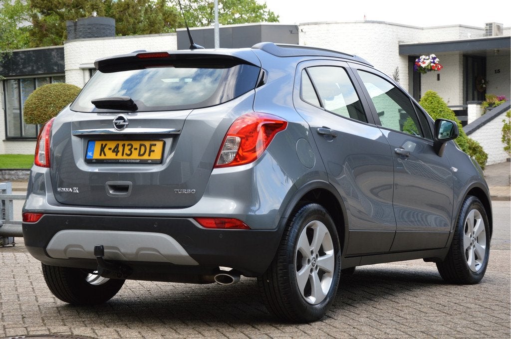 Opel Mokka X 1.4 Turbo 120 Jaar Edition NAVI | CAMERA | TREK, Auto's, Opel, Voorwielaandrijving, 12 maanden, Stof, Gebruikt