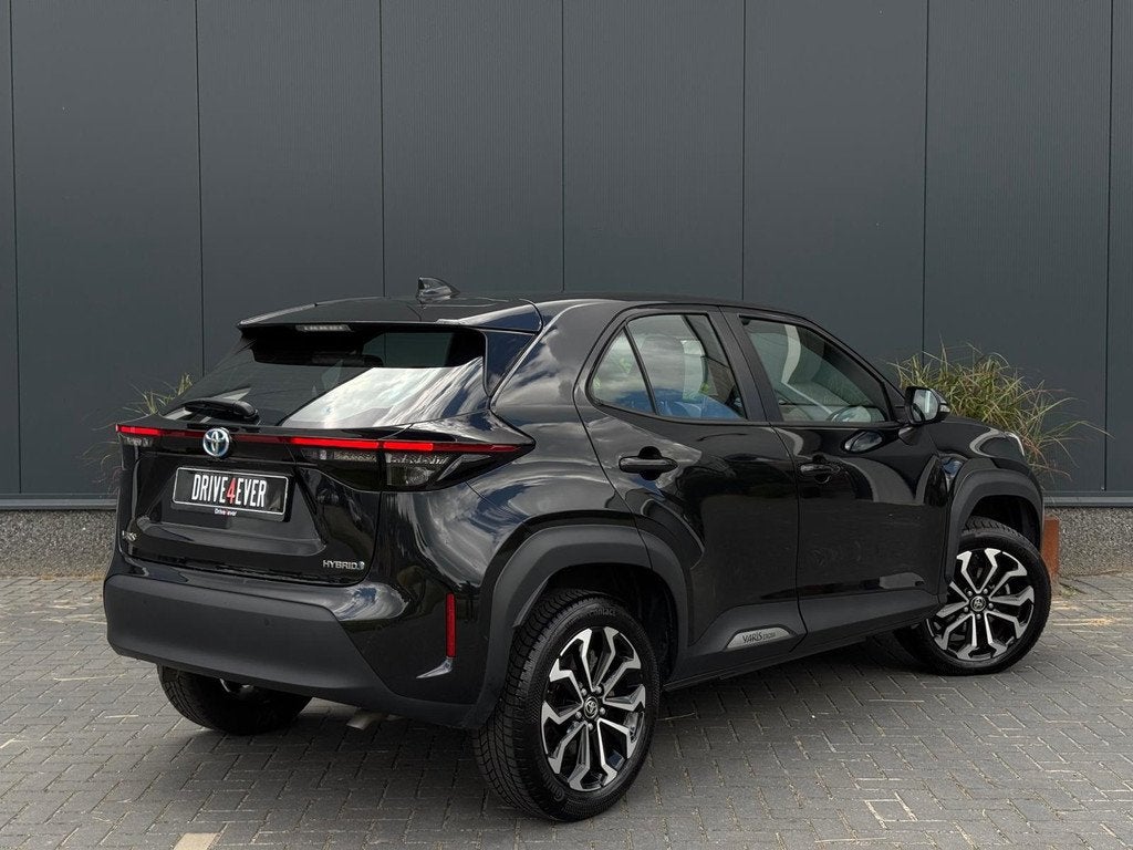 Toyota Yaris Cross 1.5 VVT-I Dynamic M24 NAVI | LED | CAMERA, Auto's, Toyota, Gebruikt, Zwart, Met garantie (alle), Zwart