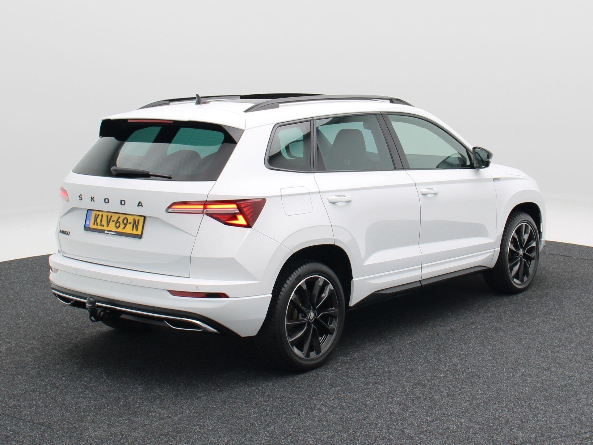 Skoda Karoq 1.5 TSi 150 Pk Automaat Sportline Business | Tre, Auto's, Stof, 4 cilinders, Wit, Karoq