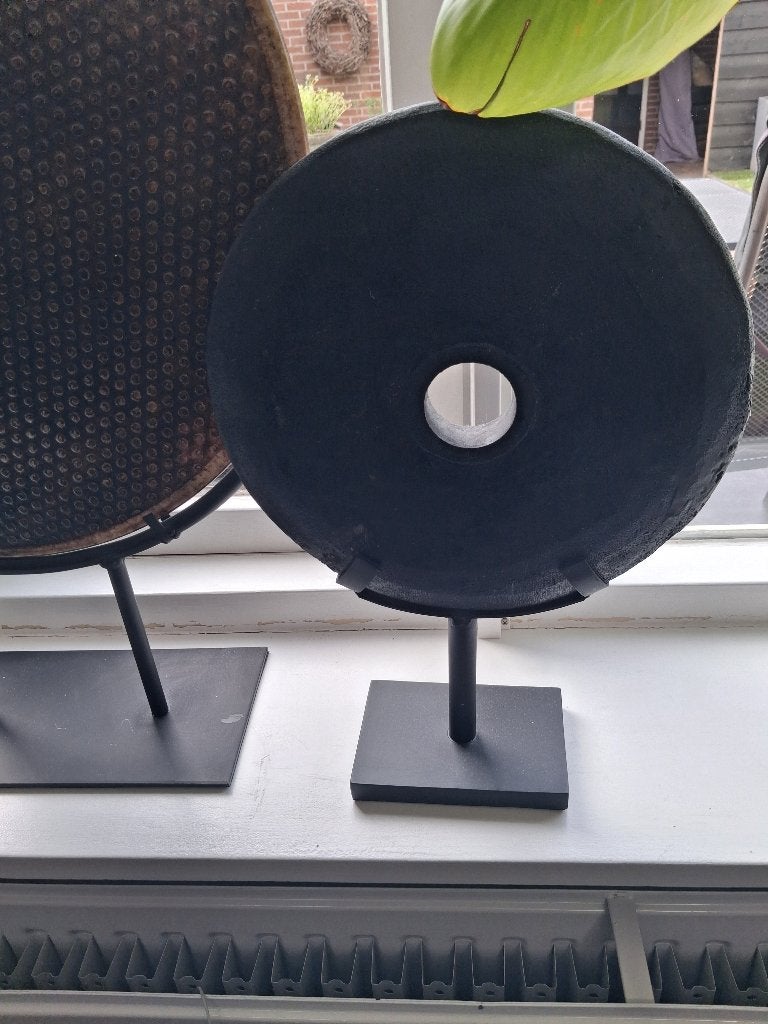 molensteen op standaard, Ophalen